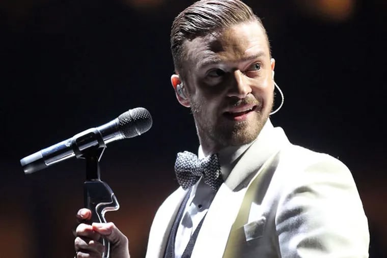 Justin Timberlake performs at the Wells Fargo Center on Sunday, November 10, 2013.  ( Yong Kim / Staff Photographer )