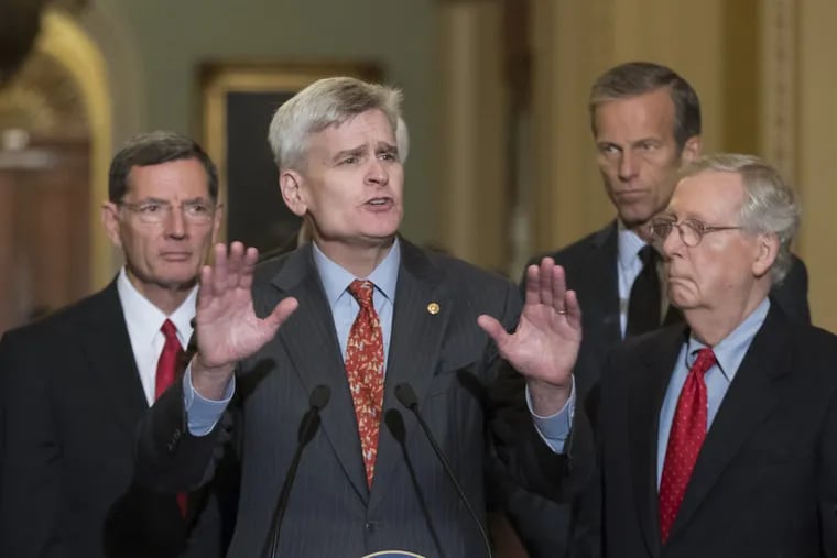 Sen. Bill Cassidy discusses the GOP health-care bill at a news conference in Washington on Sept. 19.