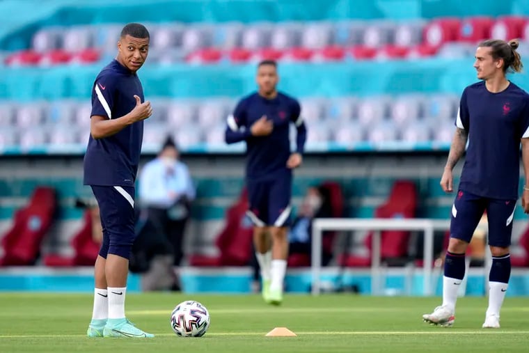 Kylian Mbappé, left, and Antoine Griezmann, right, will lead France against Germany at the European Championship.