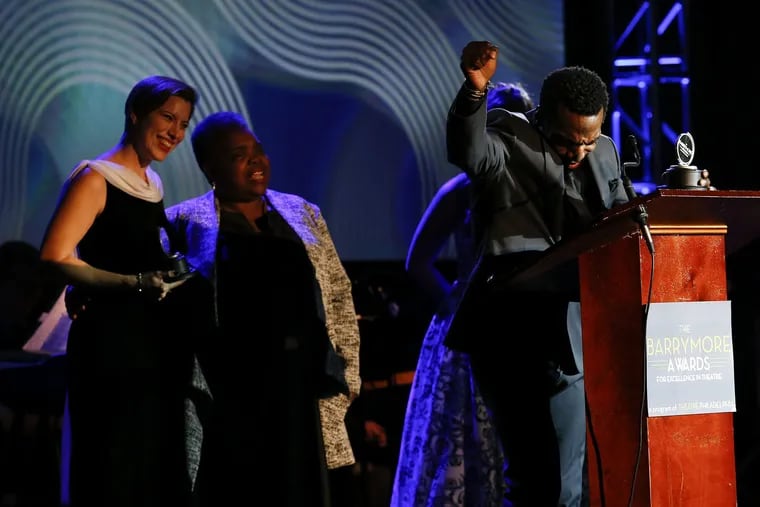 Daniel J. Watts also won a Barrymore for his role in "Lights Out" at People's Light. for outstanding supporting performance in a musical.  Co-winner Kim Carson (left) looks on.
