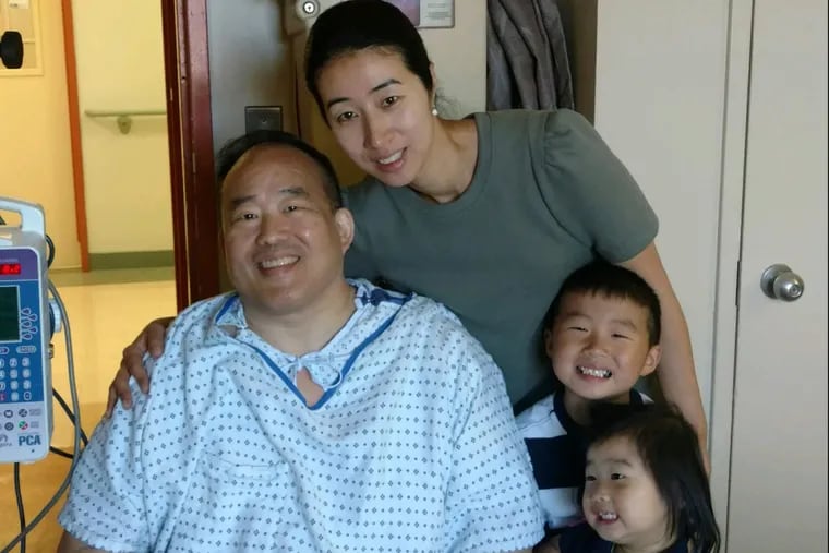 Philadelphia City Councilman David Oh recuperating at Penn Presbyterian Medical Center in Philadelphia. Oh was stabbed near his home late Wednesday evening May 31, 2017 in an attempted robbery. He is pictured with his wife, Heesun; son, Daniel; and daughter, Sarah.