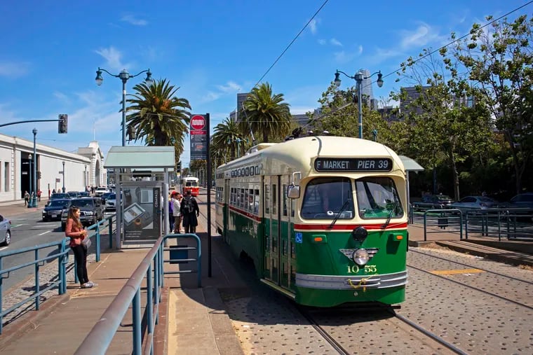 Vintage streetcars are used on the F-Line in San Francisco. Fourteen of the 17 PCC-style cars used regularly were part of the fleet in Philadelphia. The cars are painted in the colors used in some of the cities that had PCCs. This car has the colors of Philadelphia.  (Photo:  Justin Franz /  Washington Post News Service)