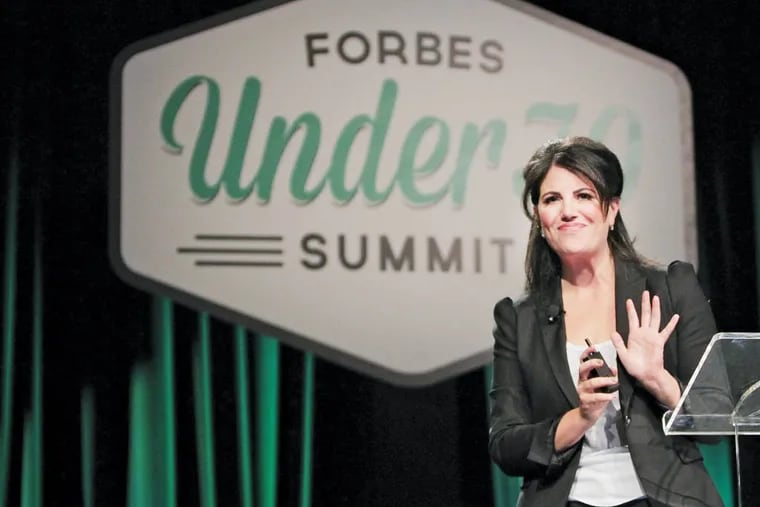 Monica Lewinsky waves goodbye to the crowd after her speech at the Forbes Under 30 Summit at the Pa. Convention Center in Philadelphia on October 20, 2014. ( DAVID MAIALETTI / Staff Photographer )