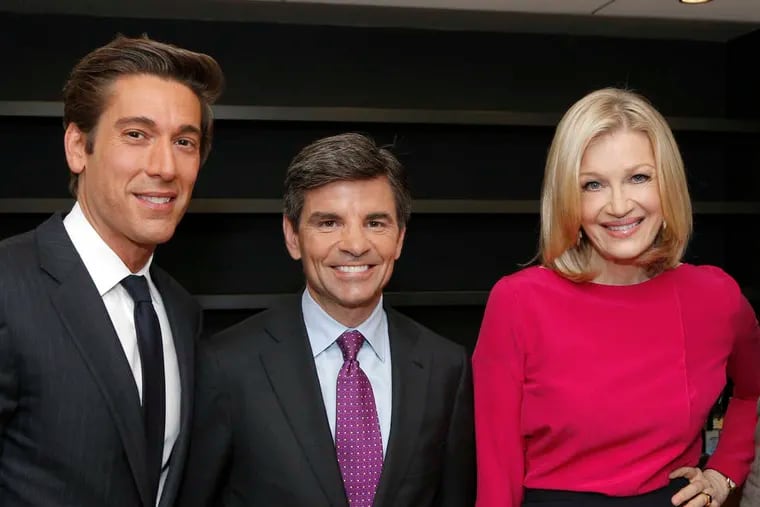 This image released by ABC News shows, from left, David Muir, George Stephanopoulos and Diane Sawyer on Wednesday, June 25, 2014, in New York.  Sawyer is stepping down as its evening news anchor, to be replaced by  Muir.