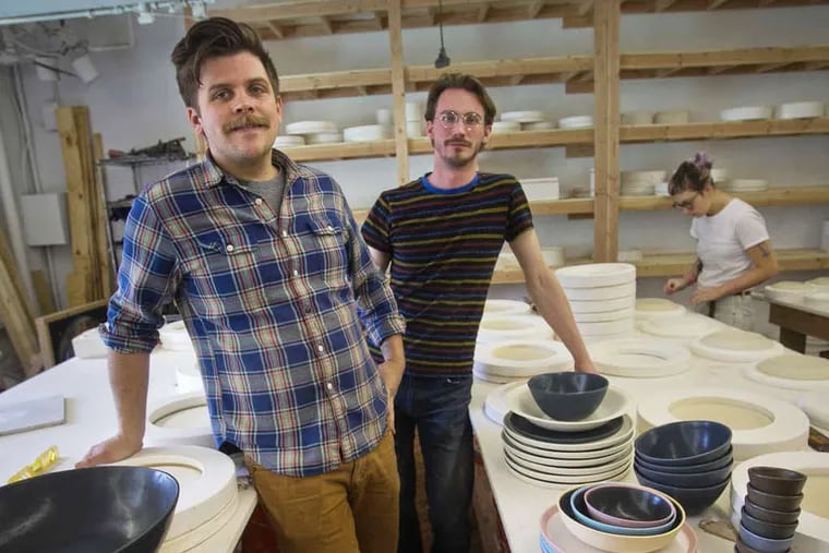 Nate Mell (left) and Wynn Bauer are founders of Felt + Fat, a local pottery company that designs wares for local restaurants. (ALEJANDRO  A. ALVAREZ / Staff Photographer)