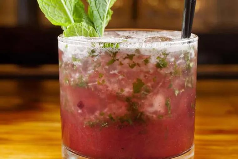 Blackberry mint julep with Four Roses bourbon, blackberry preserve and mint leaves as served at The Fat Ham, 3131 Walnut St., Philadelphia, March 6, 2014.  ( DAVID M WARREN / Staff Photographer )
