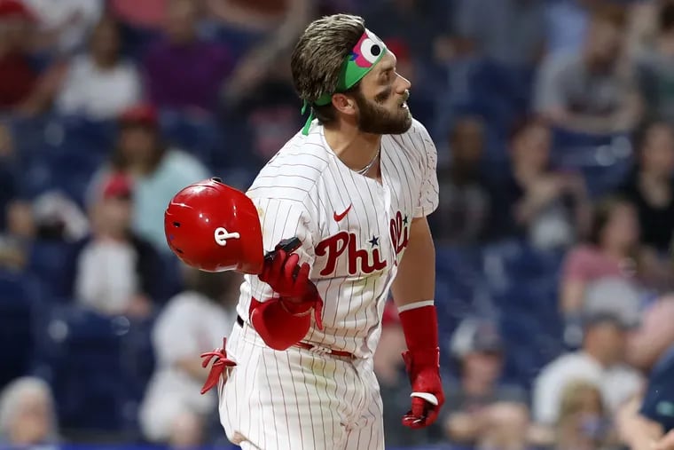 The Phillies placed Bryce Harper on the 10-day injured list Tuesday with a bruised forearm.