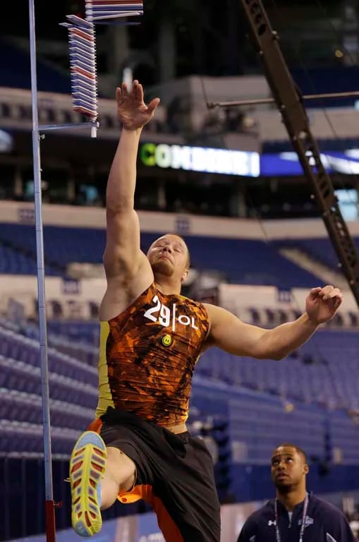Eagles right tackle Lane Johnson goes through a drill during the 2013 NFL Scouting Combine. (AP Photo/Dave Martin)