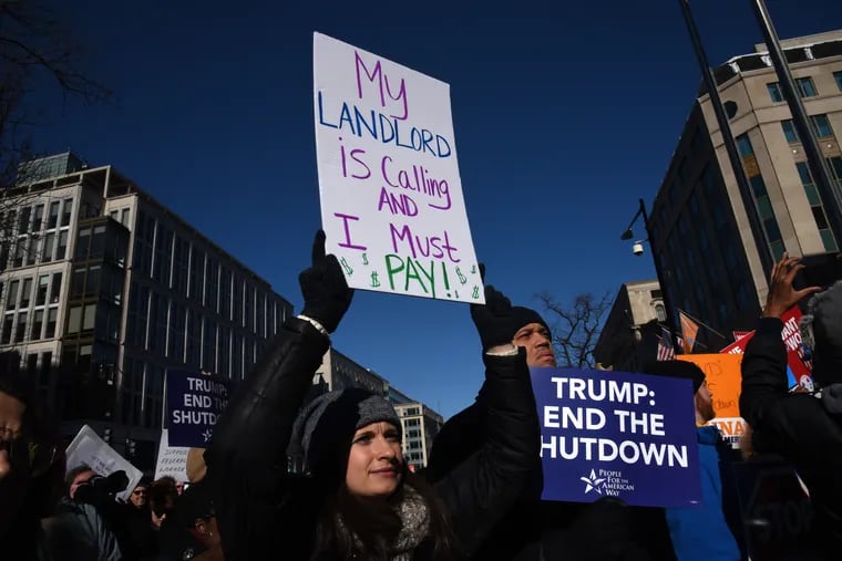 On the 20th day of a partial government shutdown, furloughed federal workers, contractors and union representatives gathered before marching to the White House to demand that President Trump reopen the government on Jan. 10, 2019 in Washington, D.C.