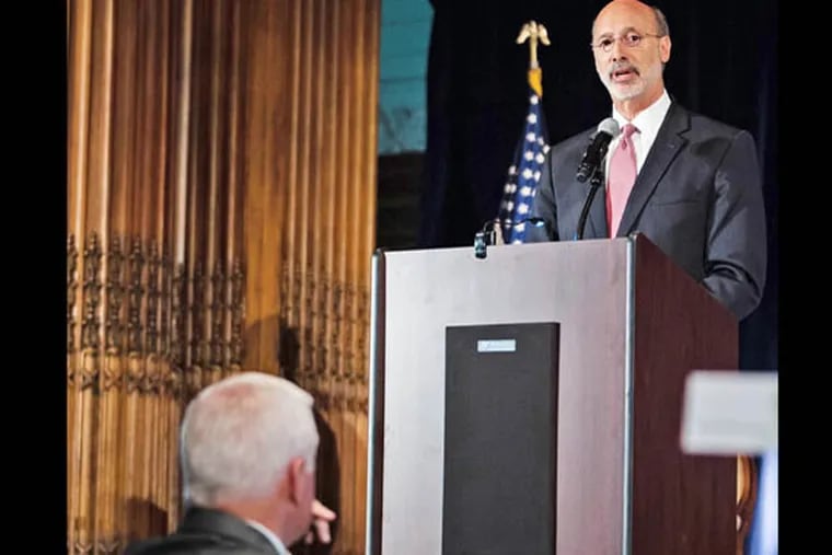 Democratic candidate for Pennsylvania Governor Tom Wolf addresses the 44th Environmental Partnership Dinner as current governor Tom Corbett looks on, Wednesday evening in Philadelphia. Corbett and Wolf outlined their environmental agendas for the state government. Wednesday, June 11, 2014, Philadelphia, Pennsylvania. ( Matthew Hall / Staff Photographer )
