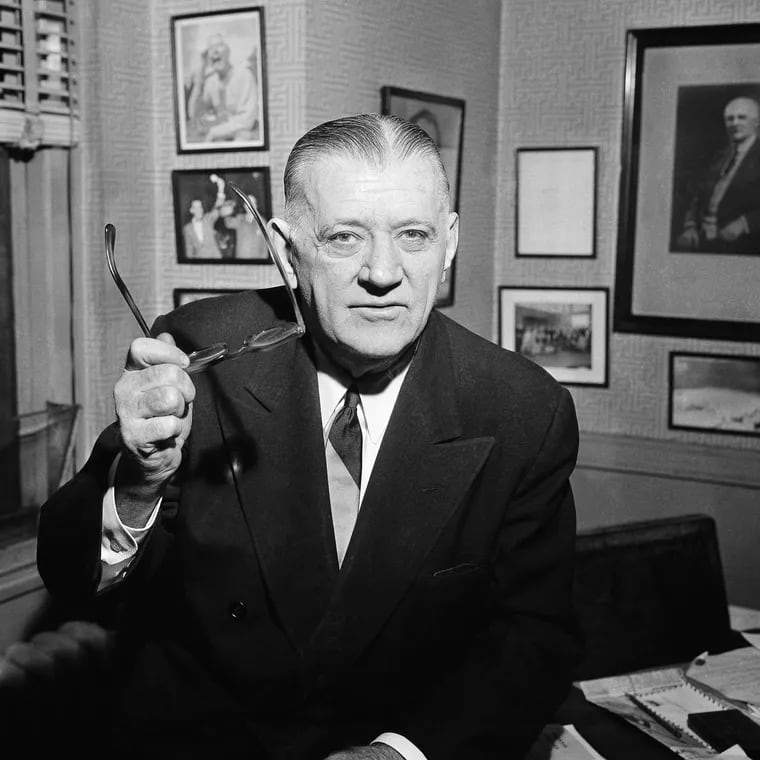 FILE - In this Feb. 13, 1957, file photo, NFL Commissioner Bert Bell gestures in his office in Philadelphia. His creation, the NFL draft, has become an industry unto itself and the league's third-most popular annual event behind the Super Bowl and opening weekend. (AP Photo/Warren M. Winterbottom, File)