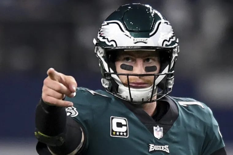 Eagles quarterback Carson Wentz is the team leader as he demonstrates during the Eagles 37-9 victory in Dallas November 29, 2017. CLEM MURRAY / Staff Photographer