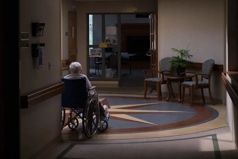 In this 2017 file photo, a nursing home resident sits in the lobby. Typically, people who live in nursing homes have access to voting, in many cases in their own facilities. But the pandemic has changed the process for these voters, and some advocates worry thousands could be disenfranchised.