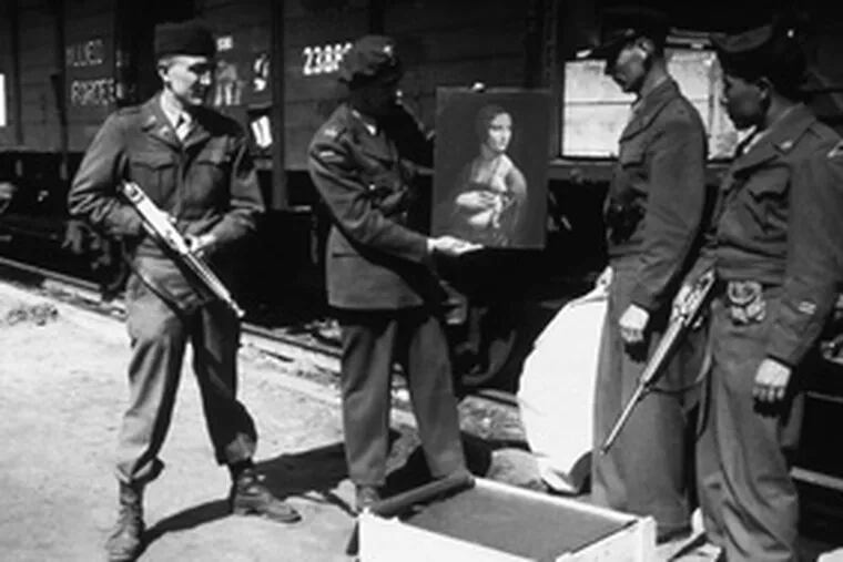 In a 1946 photograph from the documentary &quot;The Rape of Europa,&quot; Polish art historian Karol Estreicher (center, left); Lt. Frank P. Albright, a Monuments, Fine Arts and Archives officer; and two armed GIs prepare to return Leonardo da Vinci&#0039;s &quot;Lady With an Ermine&quot; to the Czartoryski Museum in Krakow, from which it had been stolen by the Nazis.