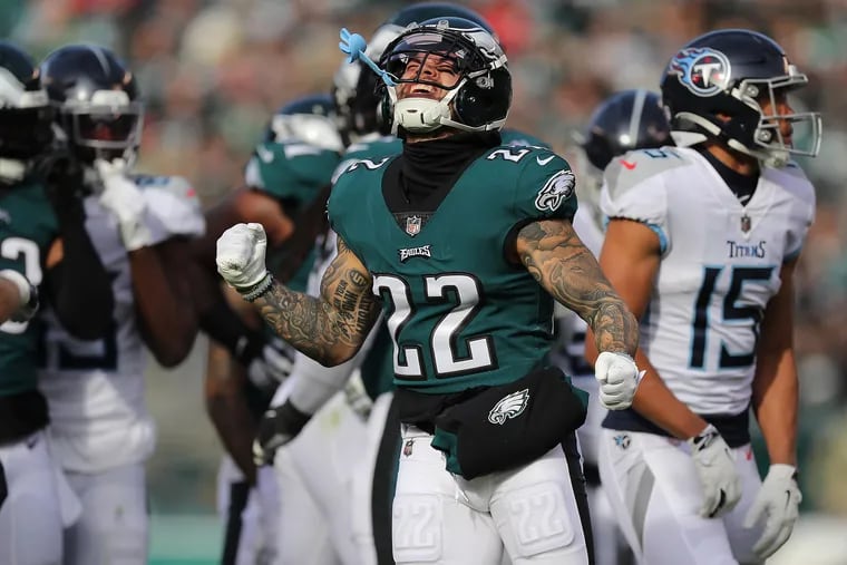 Eagles safety Marcus Epps celebrating after stopping Tennessee Titans running back Derrick Henry (not pictured) for a short gain in the first quarter on Sunday.