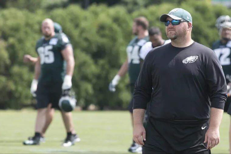 Joe Douglas, front right, at Eagles practice at the NovaCare Complex on Aug. 16, 2016, in Philadelphia.