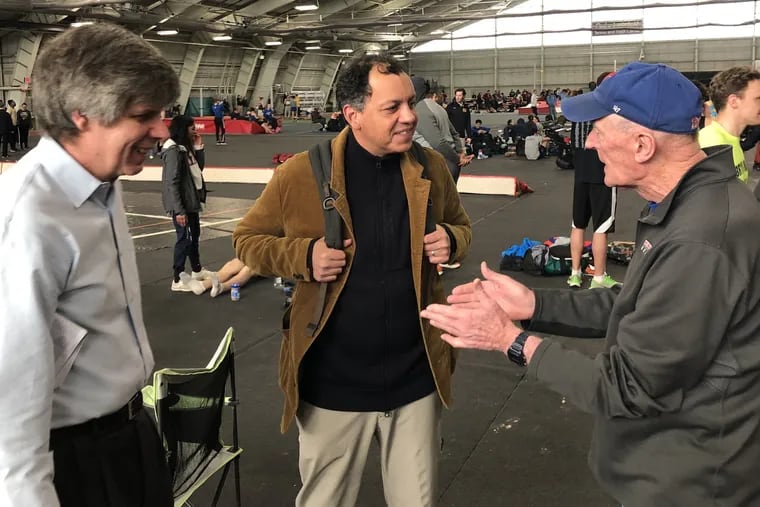 Haverford track coach Tom Donnelly, right, with former assistant Mike McGrath, left, and Robard Williams, who still holds five school records set in the late 1980s.