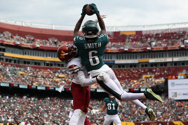 Eagles' DeVonta Smith glides like Batman as his acrobatic catches on a career day sink the Commanders