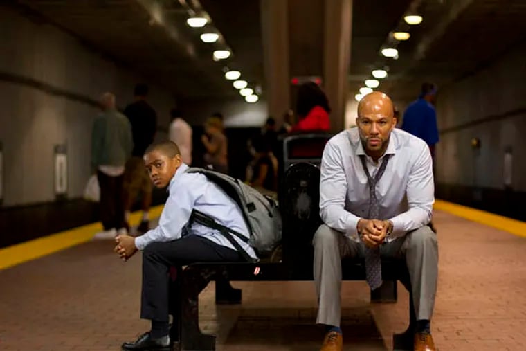 This film image released by Indomina shows Michael Rainey Jr., left, and Common in a scene from "Luv." (AP Photo/Indomina, Bill Gray)
