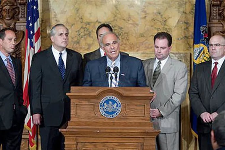 From left, Lt. Gov. Joseph B. Scarnati, Sen. Dominic F. Pileggi, Sen. Jake Corman, Gov. Ed Rendell, Rep, Keith McCall and Rep. Todd Eachus gather in the Governor's Reception room to announce they have come to a budget Friday in Harrisburg, Pa. (AP Photo / The Patriot-News, John C. Whitehead)