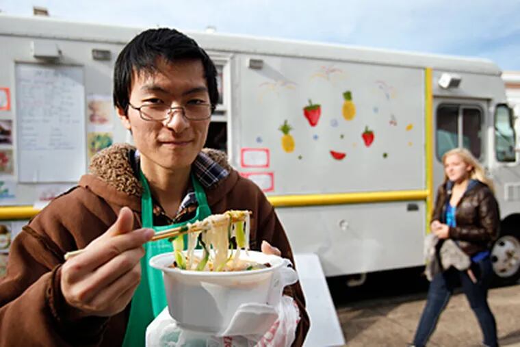 Chiso Ji with &quot;hot spice pot,&quot; at his Asian truck at Temple. (Michael S. Wirtz / Staff Photographer)