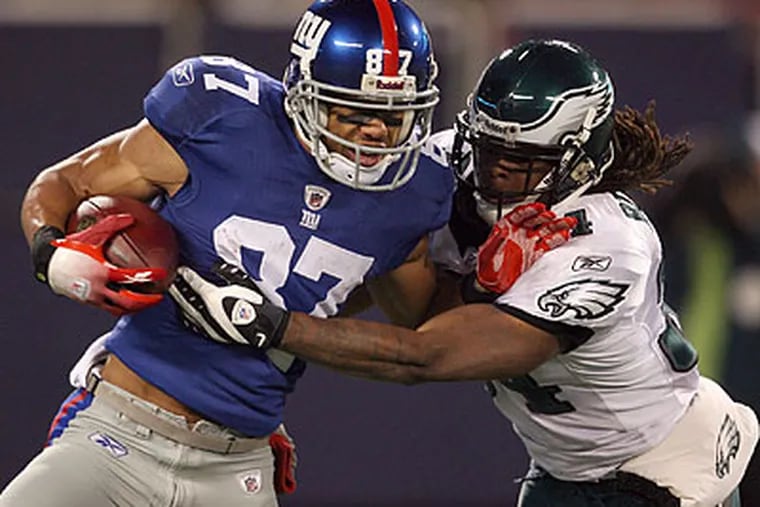 The Eagles gave up more than 500 yards of offense to the Giants. (Yong Kim/Staff Photographer)
