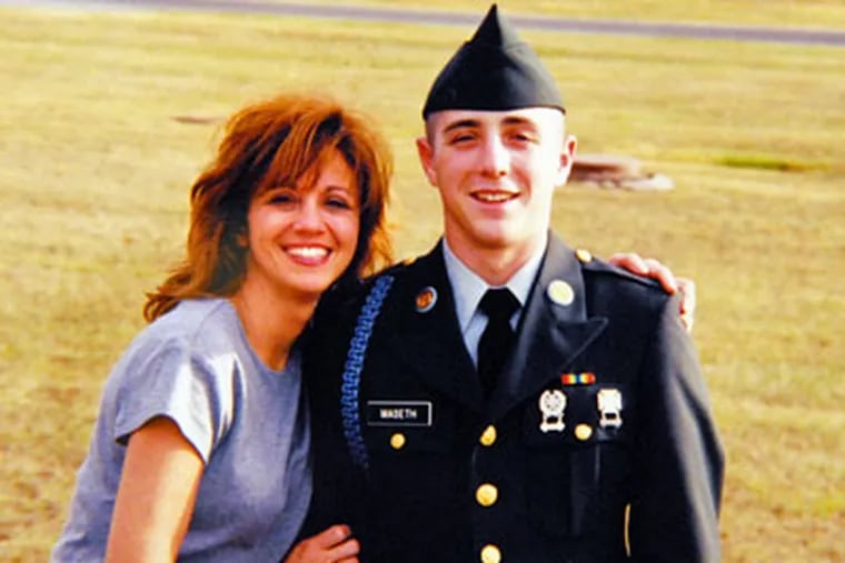 In this undated photo released by Cheryl Harris via the Post-Gazette shows Cheryl Harris with her son Staff Sgt. Ryan Maseth. Ryan, 24, was electrocuted in his shower in Iraq. (AP Photo / Family via Post-Gazette)