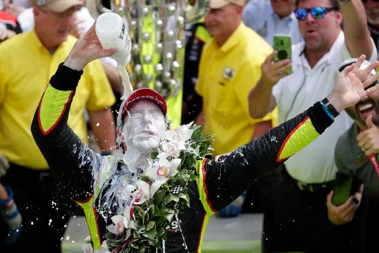 Simon Pagenaud celebrates after winning the Indy 500 on Sunday.