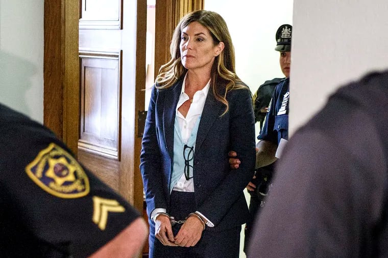 Former State Attorney General Kathleen Kane leaves court in handcuffs after her 2016 sentencing perjury and other charges. Now, she is facing new legal issues related to a March arrest on charges of drunken driving.