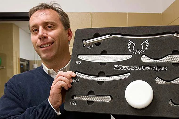 Frank Osborne came out with his HawkGrips physical-therapy tools after having difficulty getting similar products. (David M Warren/Staff)