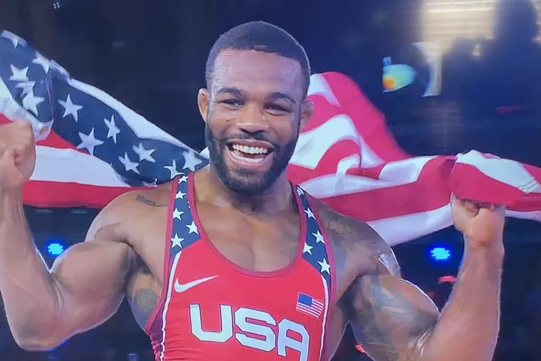 Jordan Burroughs celebrates right after winning his fifth world title.