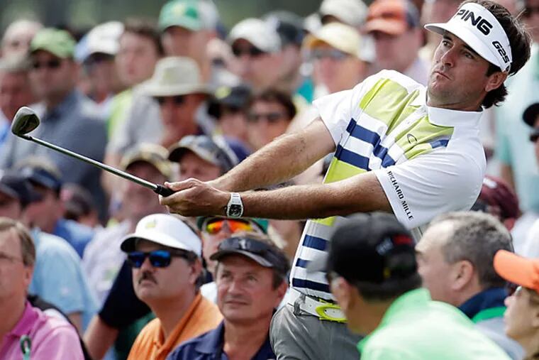 Bubba Watson watches his shot out of the gallery on the 18th hole during the second round of the Masters golf tournament Friday, April 11, 2014, in Augusta, Ga. (Darron Cummings/AP)