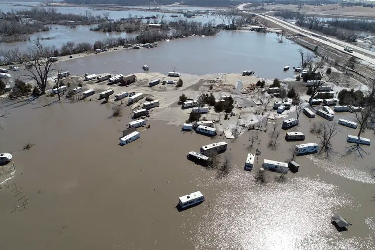 This Wednesday, March 20, 2019 aerial photo shows flooding near the Platte River in in Plattsmouth, Neb., south of Omaha. The National Weather Service is warning that flooding in parts of South Dakota and northern Iowa could soon reach historic levels. A Weather Service hydrologist says "major and perhaps historic" flooding is possible later this month at some spots on the Big Sioux and James rivers. The worst of the flooding so far has been in Nebraska, southwestern Iowa and northwestern Missouri.