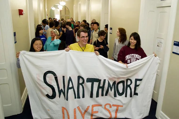 Swarthmore students end a 32-day sit-in on April 20, 2015, in a quest to push the college endowment to divest from fossil fuels. (CHARLES FOX/Staff Photographer)