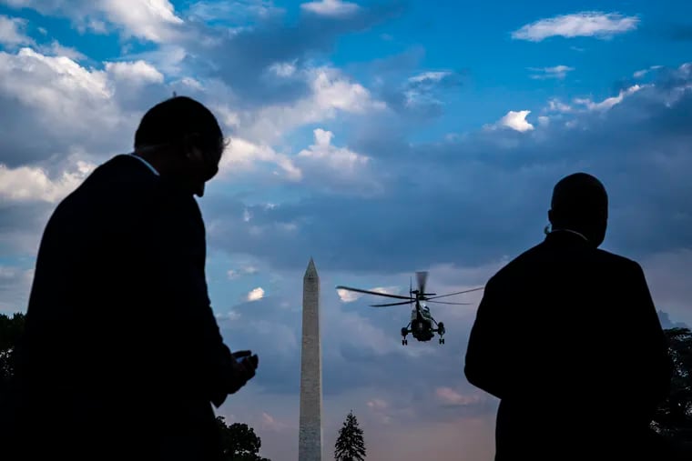 Members of the Secret Service stand guard in Washington on Sept. 12, 2019.