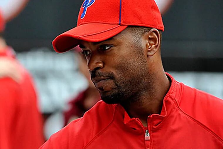 Jimmy Rollins has been out since last Wednesday after injuring his hamstring. (AP Photo/Kathy Kmonicek)