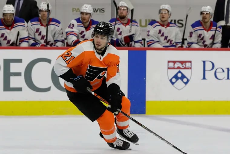 Flyers forward Scott Laughton signed a five-year contract extension Monday.