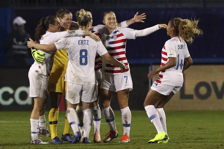 The U.S. women's soccer team celebrates at the final whistle of their 2-0 win over Canada.