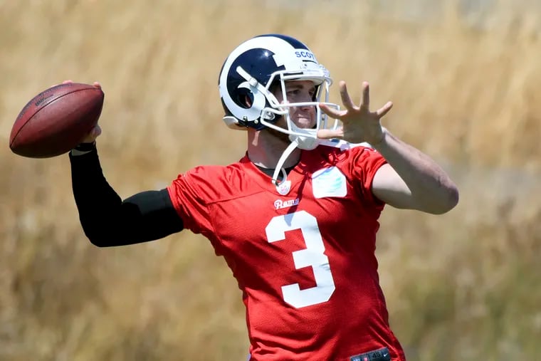 Los Angeles Rams quarterback Bryan Scott (3) passes during the NFL football rookie minicamp at the team's practice facility in Thousand Oaks, Calif., Friday, May 12, 2017. (AP Photo/Michael Owen Baker)