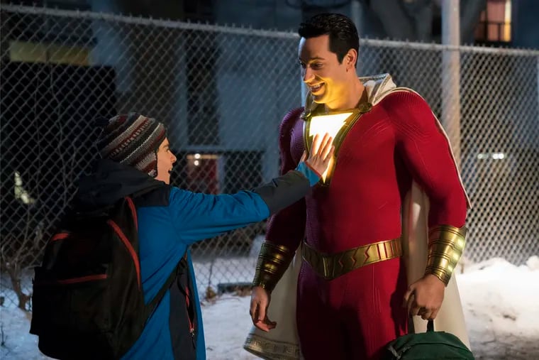 This image released by Warner Bros. shows Zachary Levi, right, and Jack Dylan Grazer in a scene from 2019's "Shazam!"