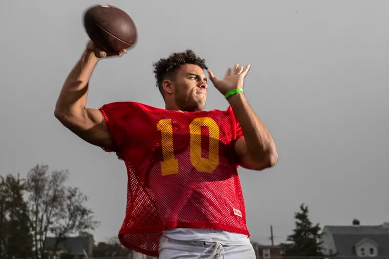 Haverford High quarterback Trey Blair warms up his arm at practice on Tuesday October 22, 2019.  He will sign with Temple on Wednesday.