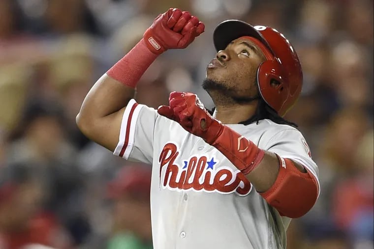 Phillies third baseman Maikel Franco celebrates his three-run home run during the ninth inning of a baseball game against the Washington Nationals on Friday.