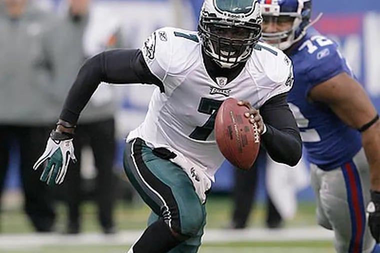 Michael Vick could get the Eagles' franchise player tag in the offseason. (Yong Kim/Staff file photo)