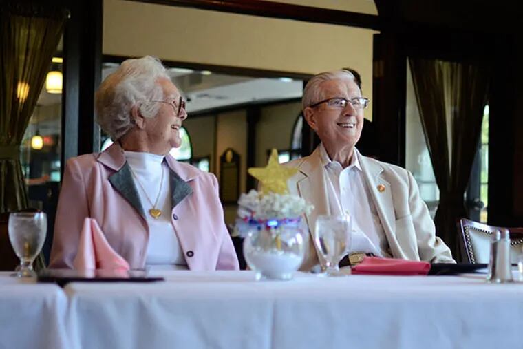 Two graduates of Ocean City High School, Elizabeth Broadley, class of ’44 (left) and Gam Broadley, class of ’42 sit at the Ocean City High School Class of 1944 reunion lunch at the Great Bay Country Club in Somers Point, NJ. The couple has been married for 67 years. (VIVIANA PERNOT/Staff Photographer)