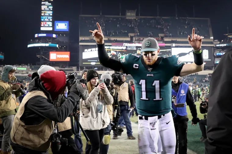 Eagles quarterback Carson Wentz celebrates after leading the way in Sunday's 17-9 over the Dallas Cowboys at Lincoln Financial Field.
