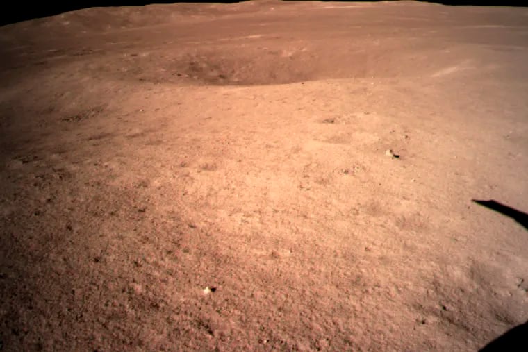 In this photo provided Jan. 3, 2019, by China National Space Administration via Xinhua News Agency, the first image of the moon's far side taken by China's Chang'e-4 probe.  A Chinese spacecraft on Thursday, Jan. 3,  made the first-ever landing on the far side of the moon, state media said. The lunar explorer Chang'e 4 touched down at 10:26 a.m., China Central Television said in a brief announcement at the top of its noon news broadcast. (China National Space Administration/Xinhua News Agency via AP)