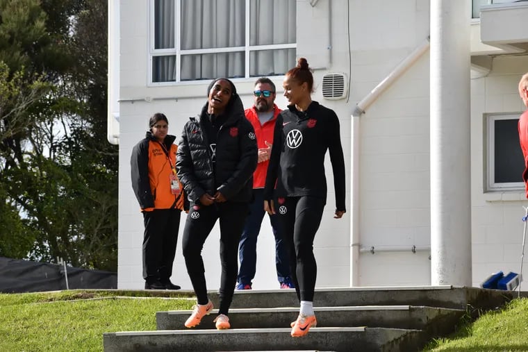 Naomi Girma (left) and Lynn Williams shared a laugh as they arrived at Monday's U.S. team practice in suburban Auckland.