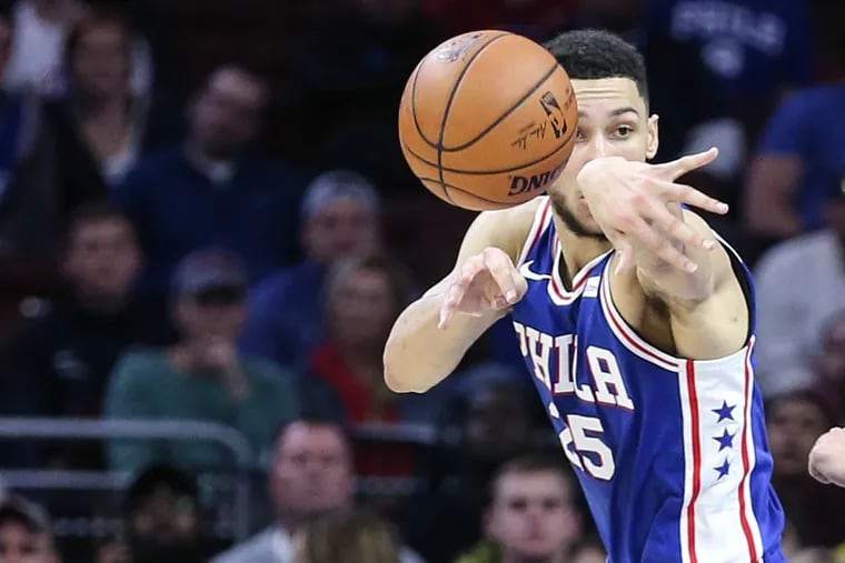 Ben Simmons throws a pass against the Hawks during the first quarter.