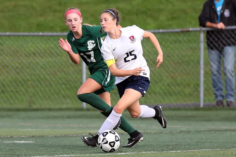 Eastern's Sara Brocious (right) battles with Camden Catholic's Taylor Gardner in a recent game.