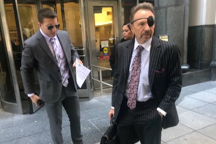 Ari Goldstein, left, former president of Temple University's Alpha Epsilon Pi fraternity, leaves the Criminal Justice Center after a preliminary hearing alongside his attorney, Perry de Marco Sr.